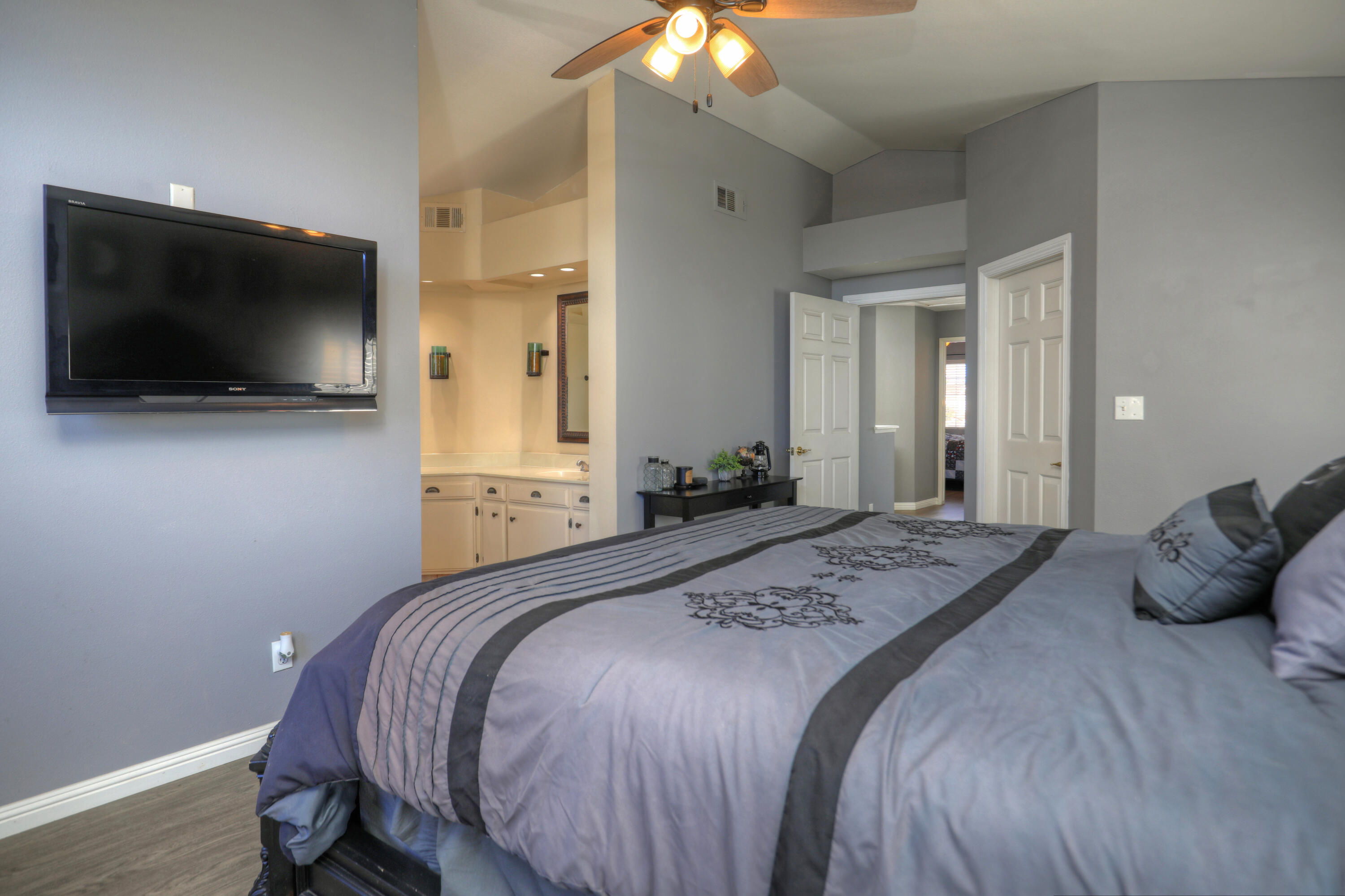 1337 Westbrook Drive Lompoc, CA 93436 - Photo 19 of 28 a bedroom with a bed and a flat screen tv
