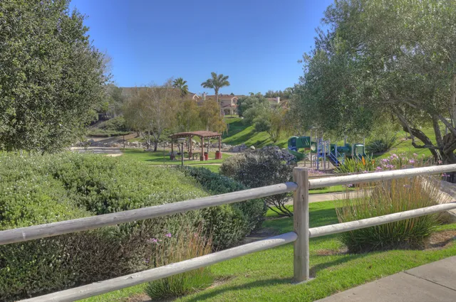 a view of a deck with a yard