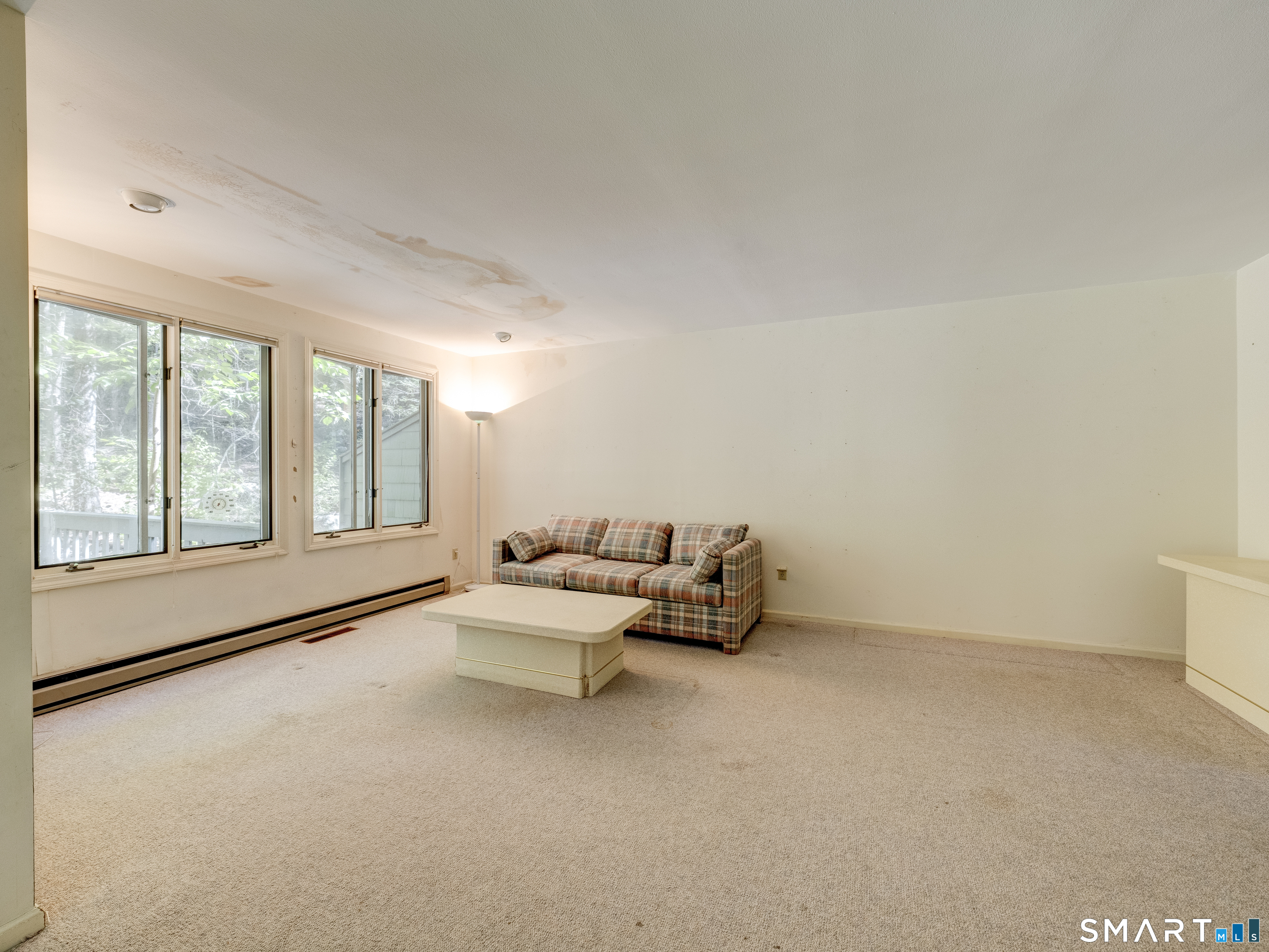 478 Evergreen Road Torrington, CT 06790 - Photo 16 of 39 lots of natural light with walls of windows