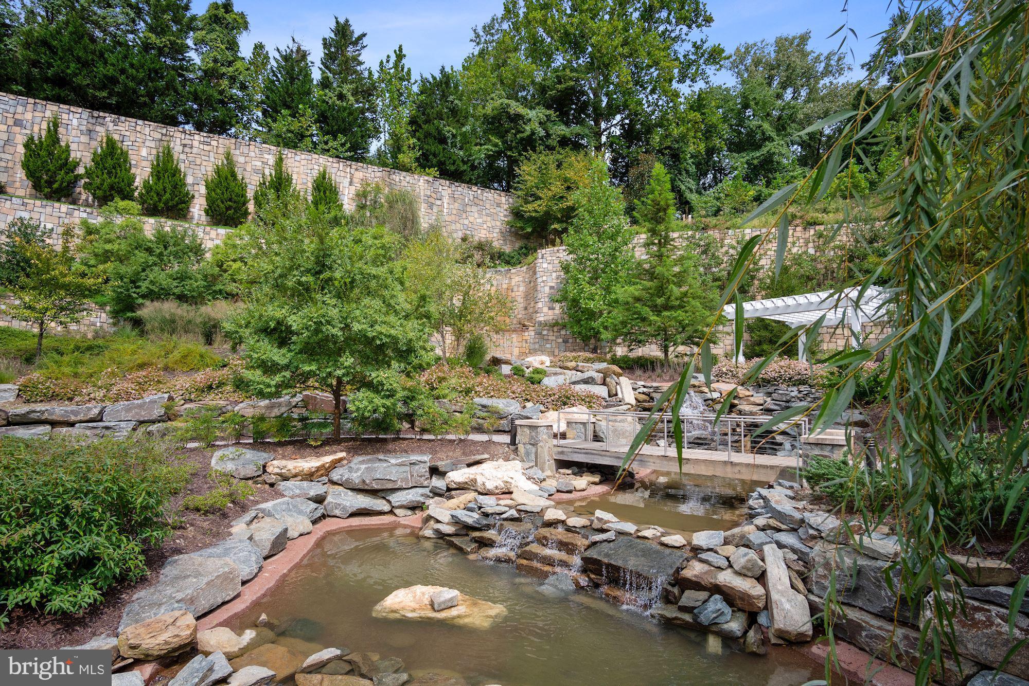 8121 River Road, Unit 431 Bethesda, MD 20817 - Photo 50 of 51 Tiered quarry rock wall