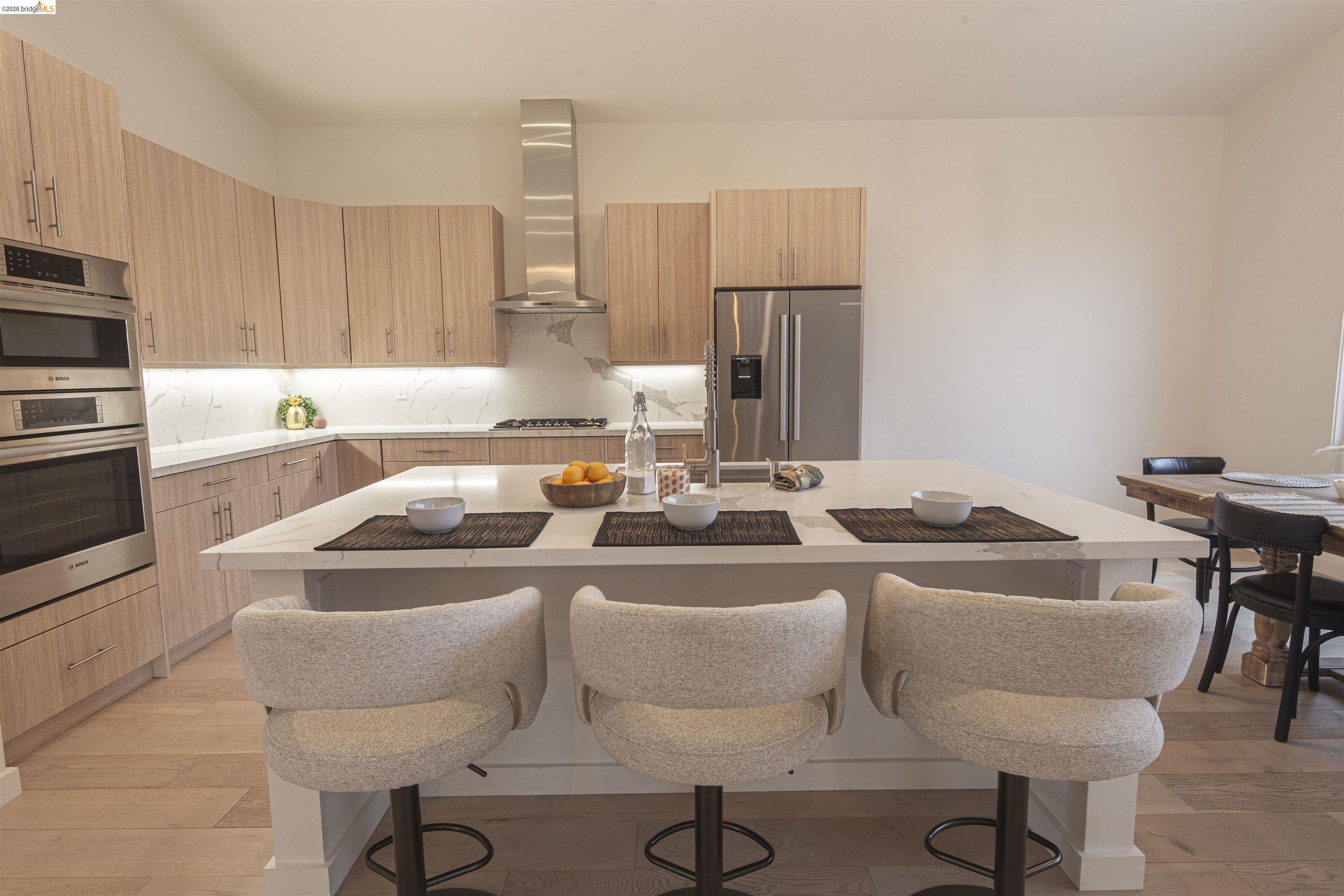 18870 Old Bridge Road Jamestown, CA 95327 - Photo 14 of 57 a white kitchen with a sink cabinets and appliances