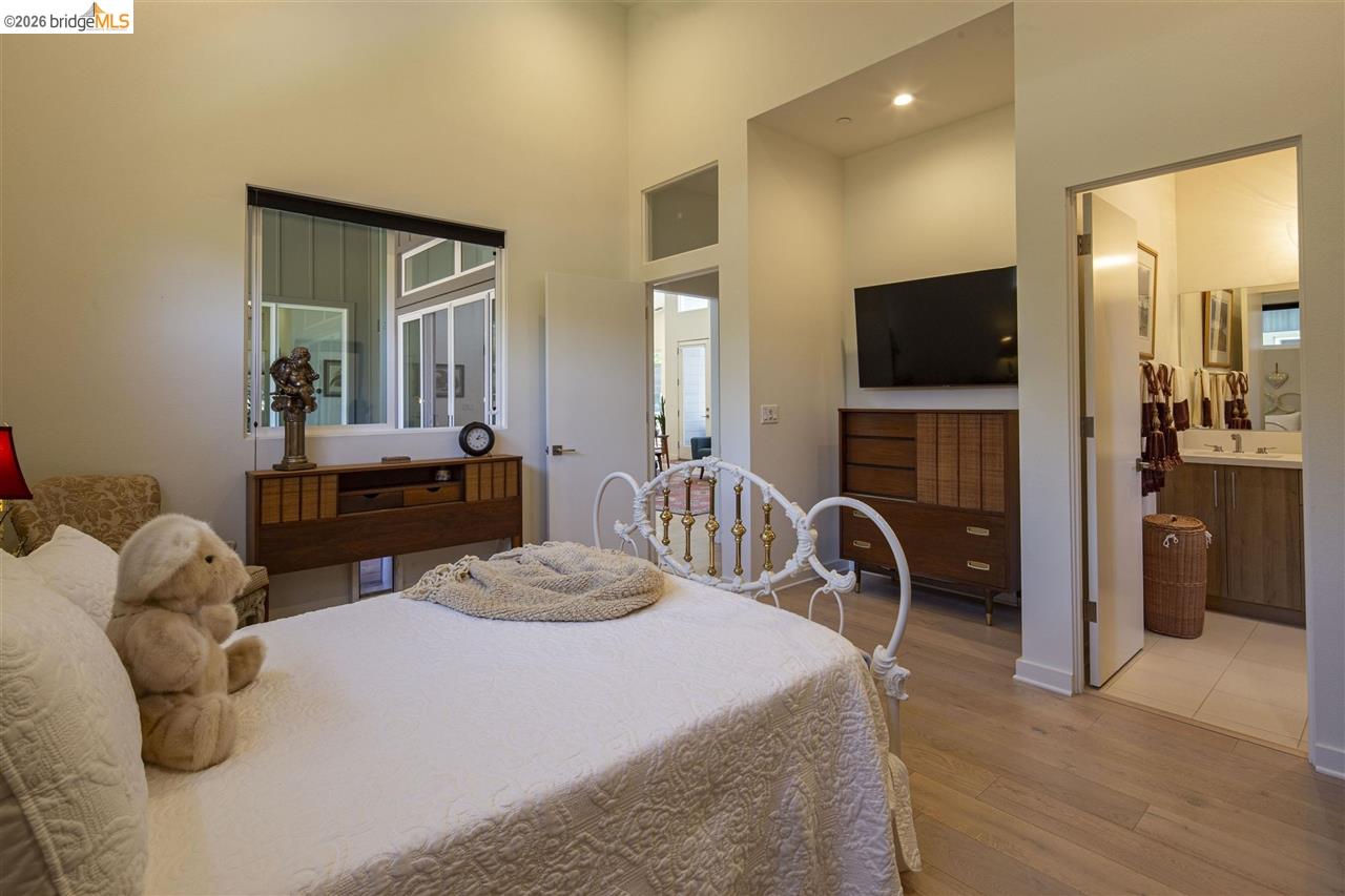 18870 Old Bridge Road Jamestown, CA 95327 - Photo 22 of 57 a bedroom with furniture and a flat screen tv