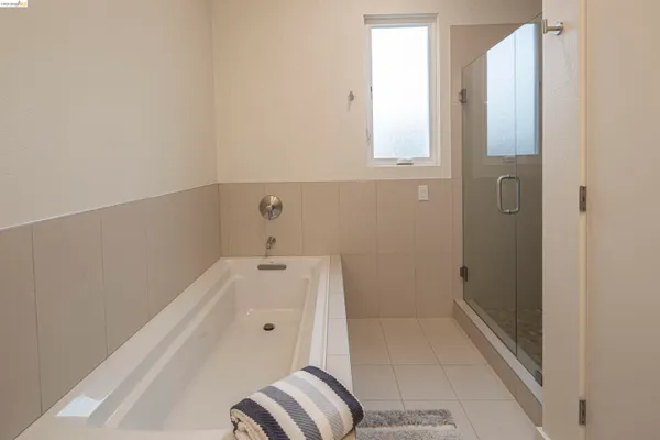 a bathroom with a sink a mirror and vanity