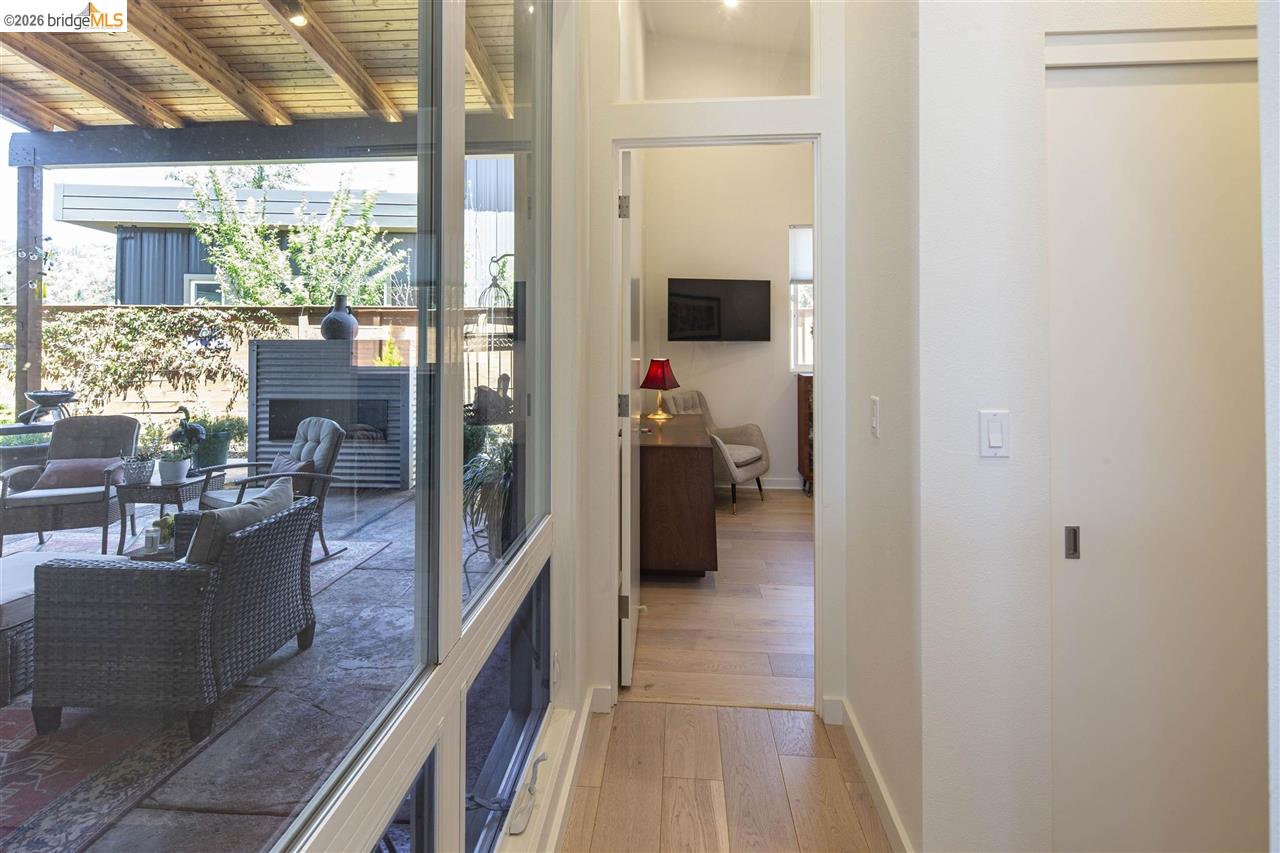 18870 Old Bridge Road Jamestown, CA 95327 - Photo 26 of 57 a hallway with living room and dining room view