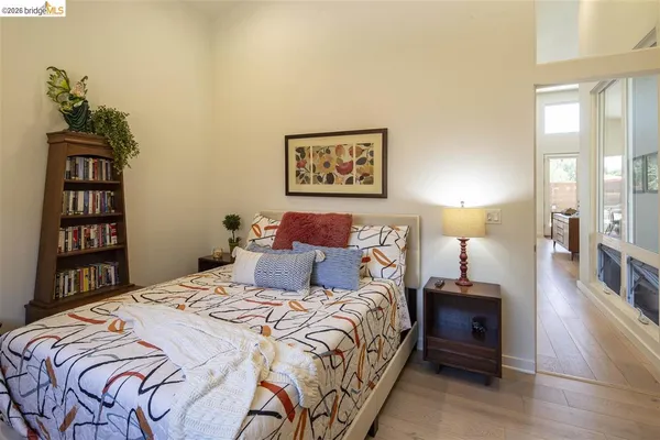 a bedroom with a bed and a closet