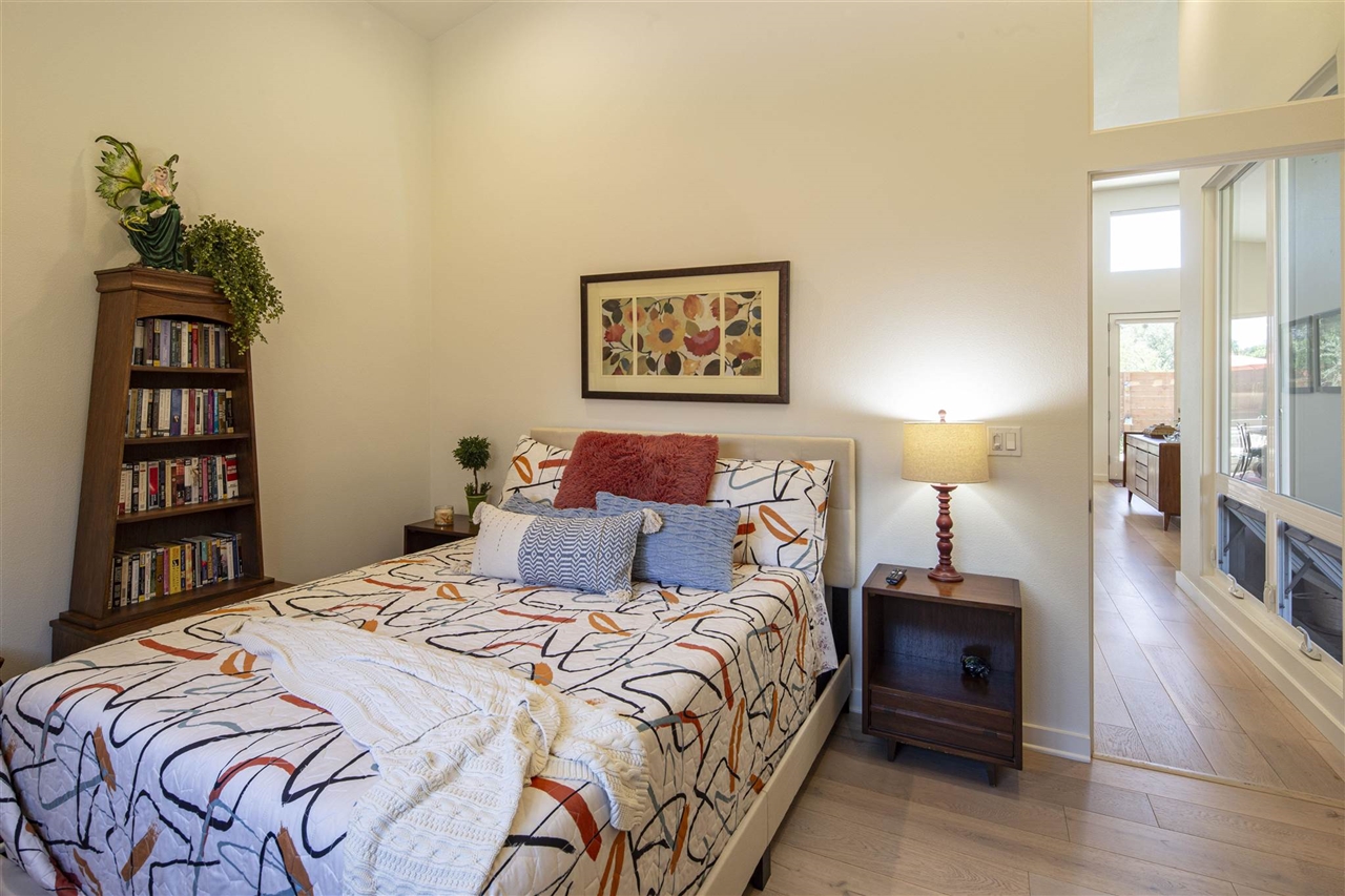 18870 Old Bridge Road Jamestown, CA 95327 - Photo 28 of 57 Bedroom featuring wood-type flooring and high vaulted ceiling
