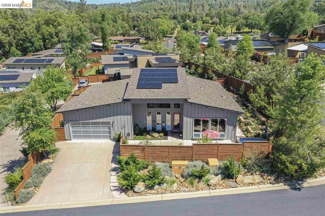 18870 Old Bridge Road Jamestown, CA 95327 - Photo 3 of 57 an aerial view of a house with a yard and potted plants