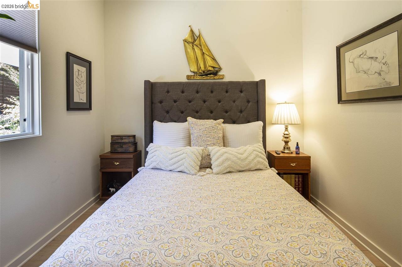 18870 Old Bridge Road Jamestown, CA 95327 - Photo 33 of 57 a bedroom with a bed and painting on the wall