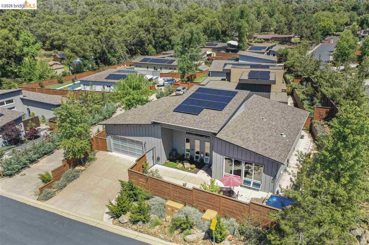 18870 Old Bridge Road Jamestown, CA 95327 - Photo 4 of 57 an aerial view of a house with a garden and plants