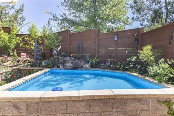 an aerial view of a house with outdoor space
