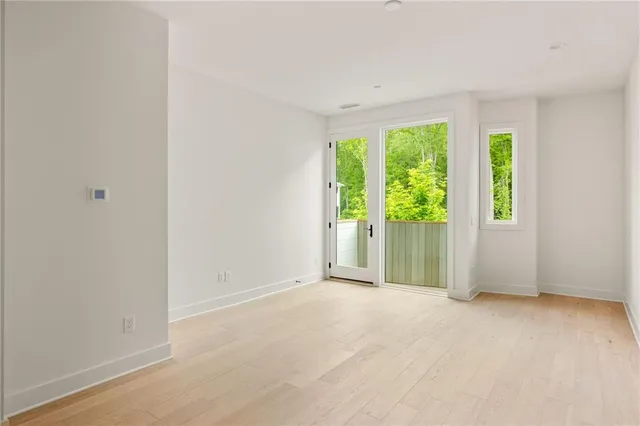 a view of a room with a large window