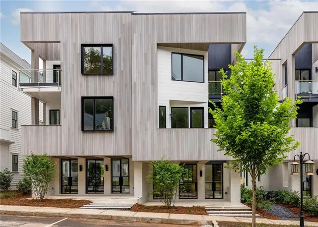 a view of a building with a street