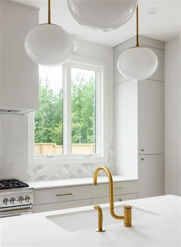a bathroom with a sink and a bathtub