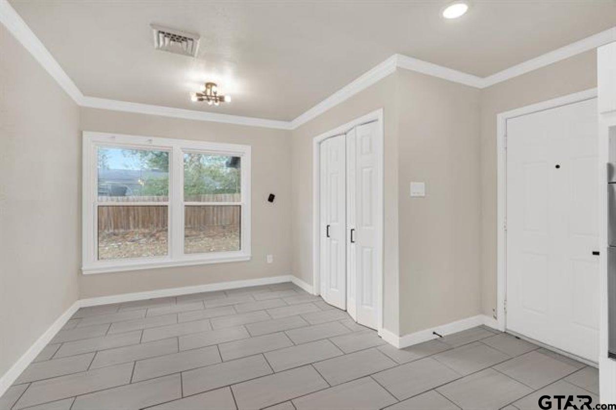 2425 Oak Lane Tyler, TX 75701 - Photo 11 of 33 a view of an empty room with a window