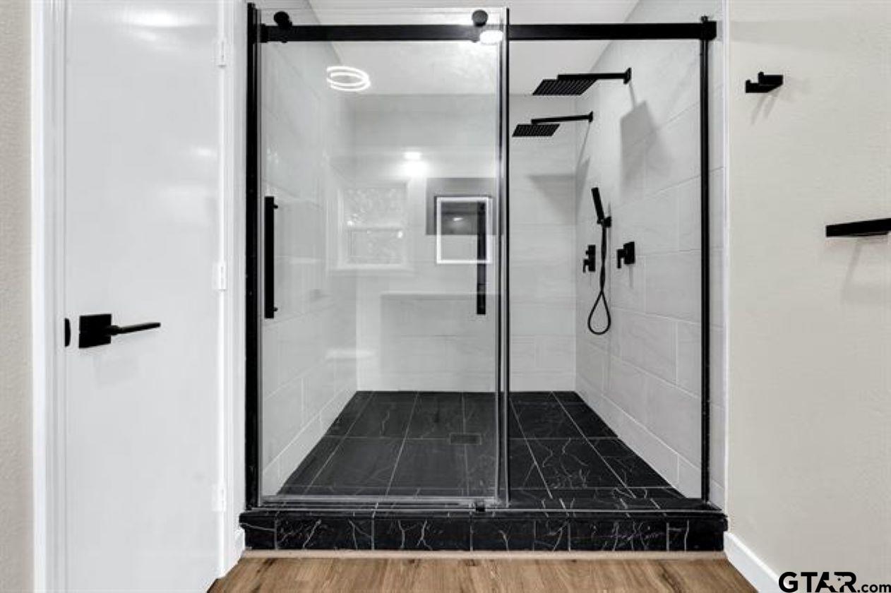 2425 Oak Lane Tyler, TX 75701 - Photo 24 of 33 a bathroom with a shower