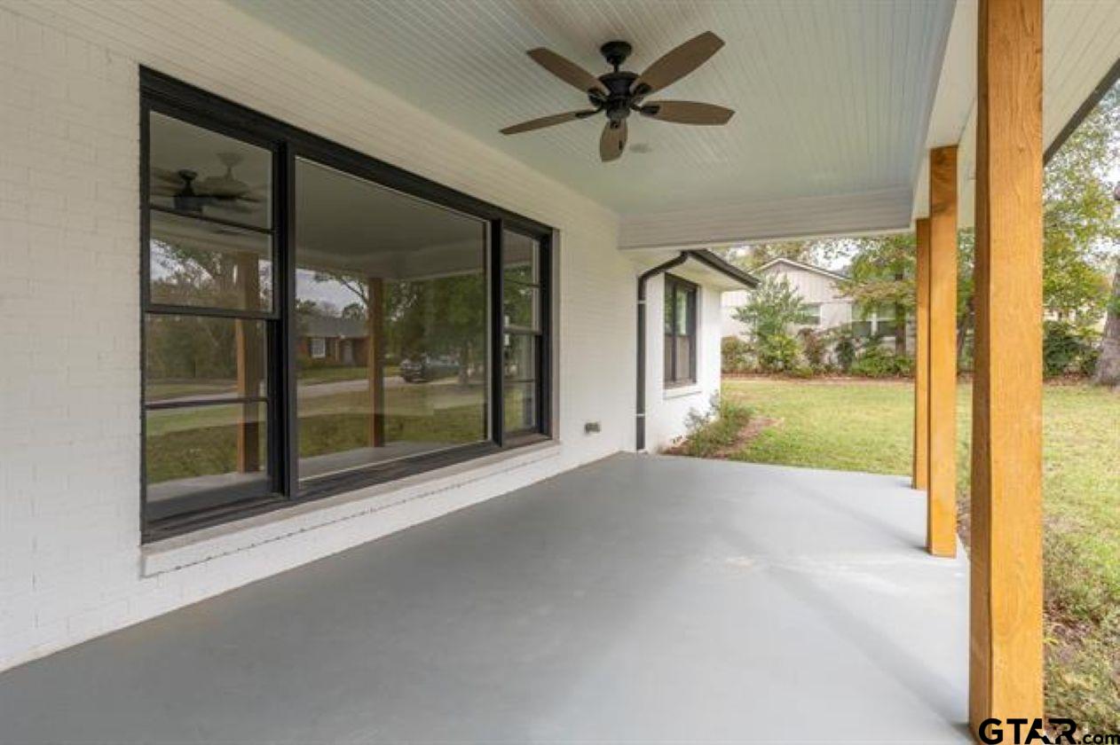 2425 Oak Lane Tyler, TX 75701 - Photo 3 of 33 a view of a porch with a floor to ceiling window