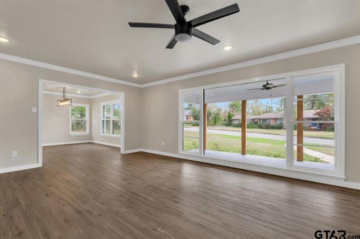 2425 Oak Lane Tyler, TX 75701 - Photo 7 of 33 a view of room with window and hardwood floor