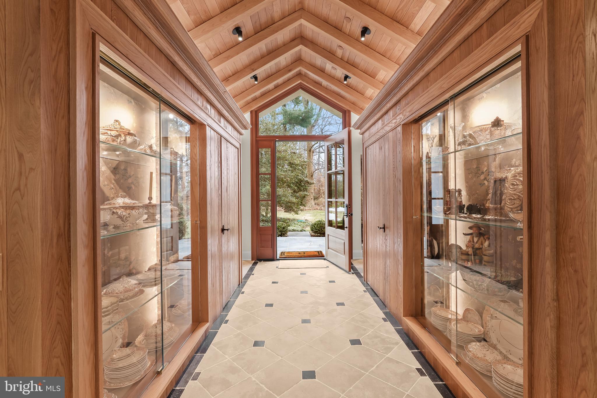 616 Cotterill Road Gibson Island, MD 21056 - Photo 8 of 54 Custom Glass Front Cabinetry in Foyer