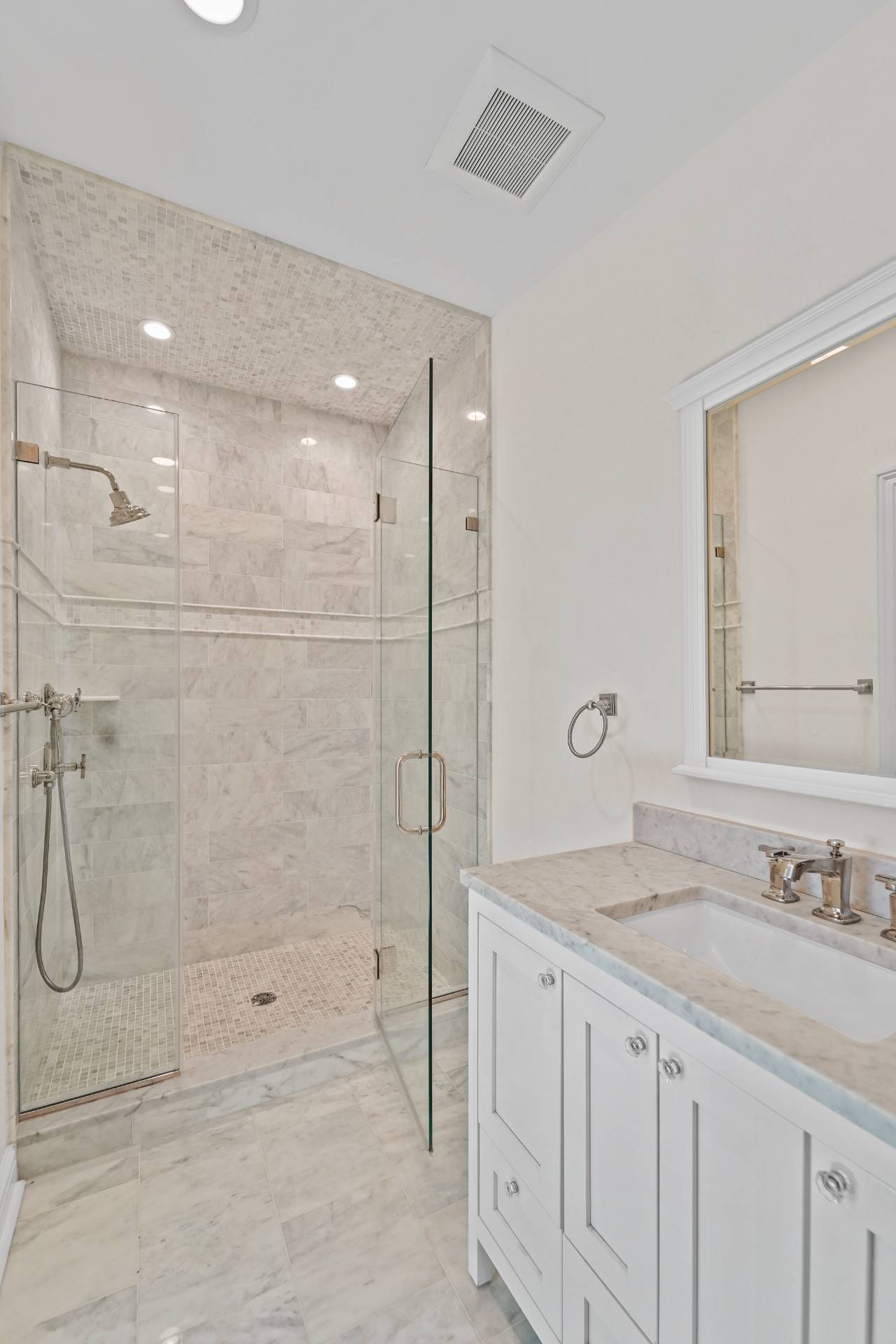 Undisclosed Address Westhampton, NY 11978 - Photo 15 of 22 a bathroom with a granite countertop sink a shower and a mirror