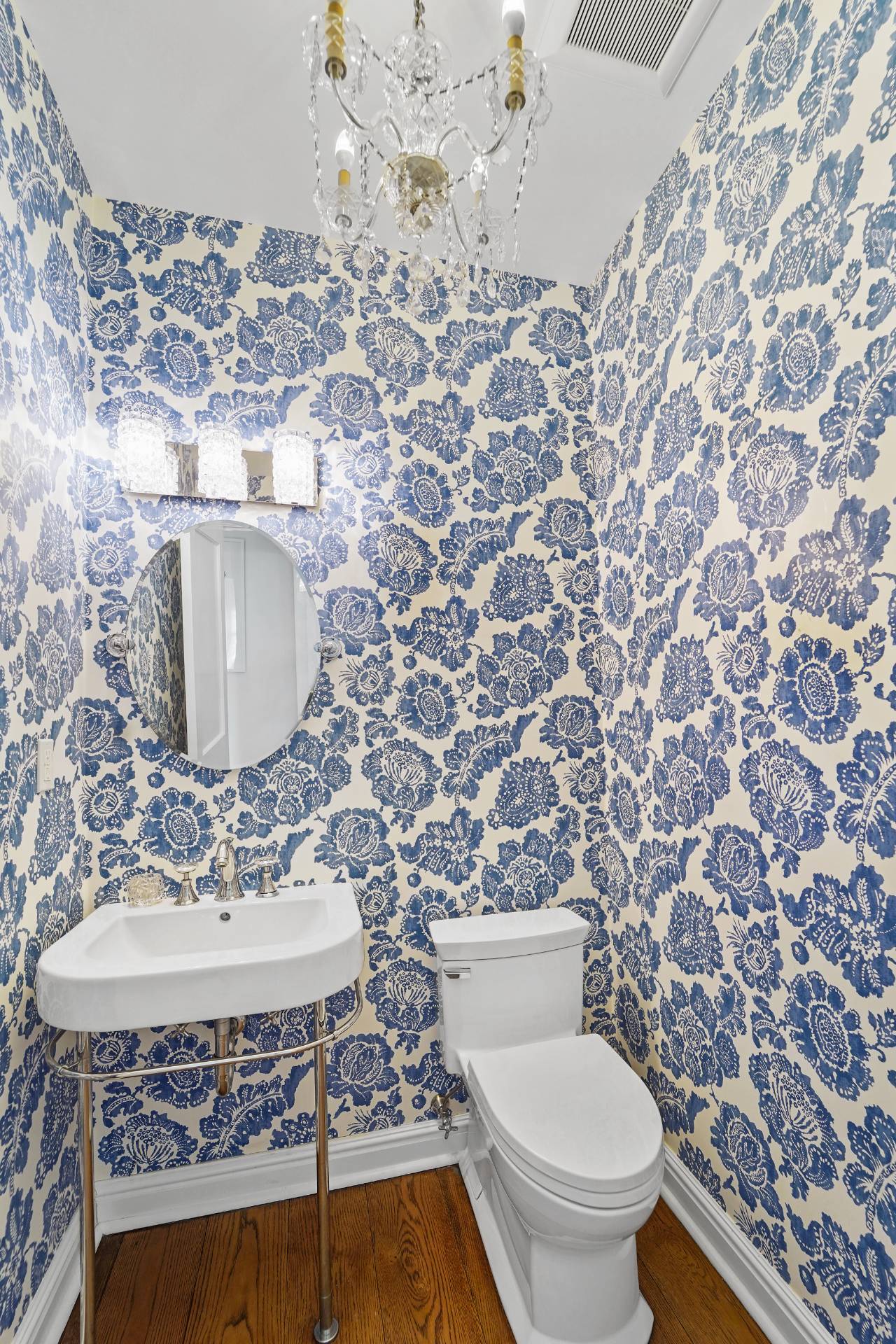 Undisclosed Address Westhampton, NY 11978 - Photo 16 of 22 a bathroom with a sink a toilet and a mirror