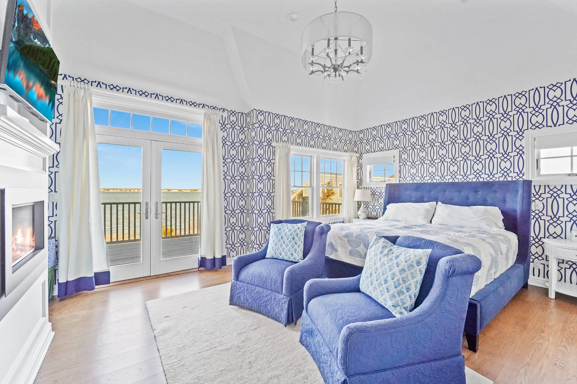 Undisclosed Address Westhampton, NY 11978 - Photo 18 of 22 a spacious bedroom with a bed and a couch