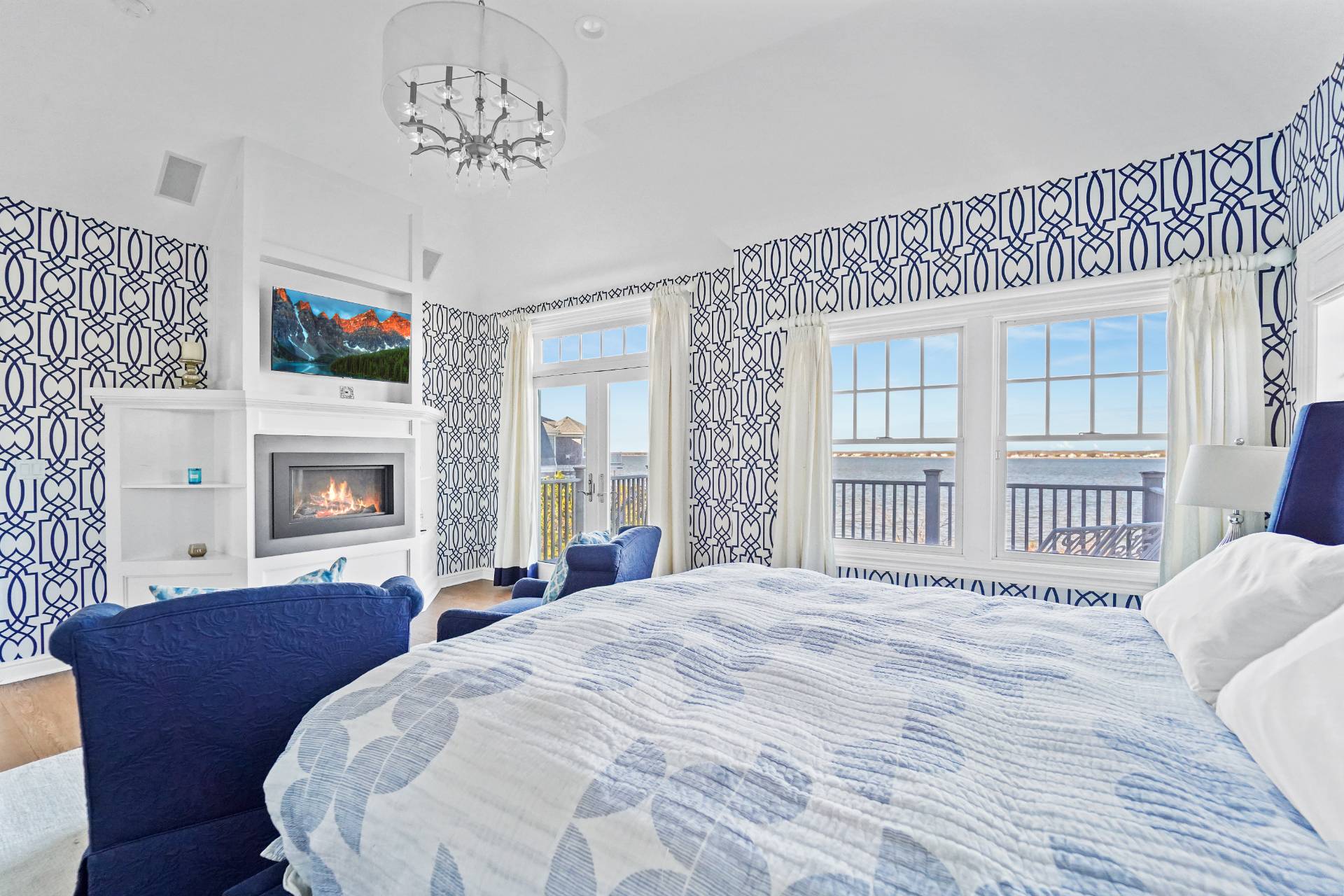 Undisclosed Address Westhampton, NY 11978 - Photo 19 of 22 a bedroom with a large bed and a tv