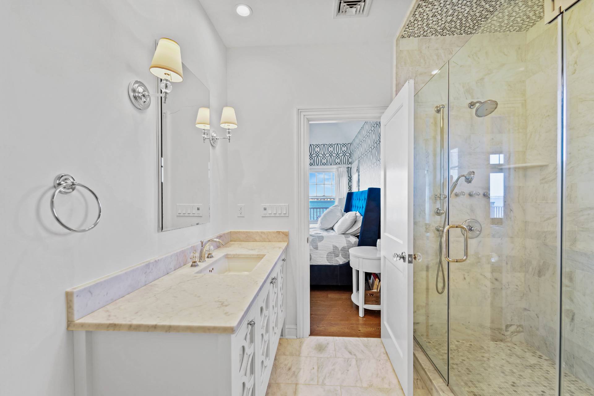 Undisclosed Address Westhampton, NY 11978 - Photo 20 of 22 a bathroom with a granite countertop sink a shower and a mirror