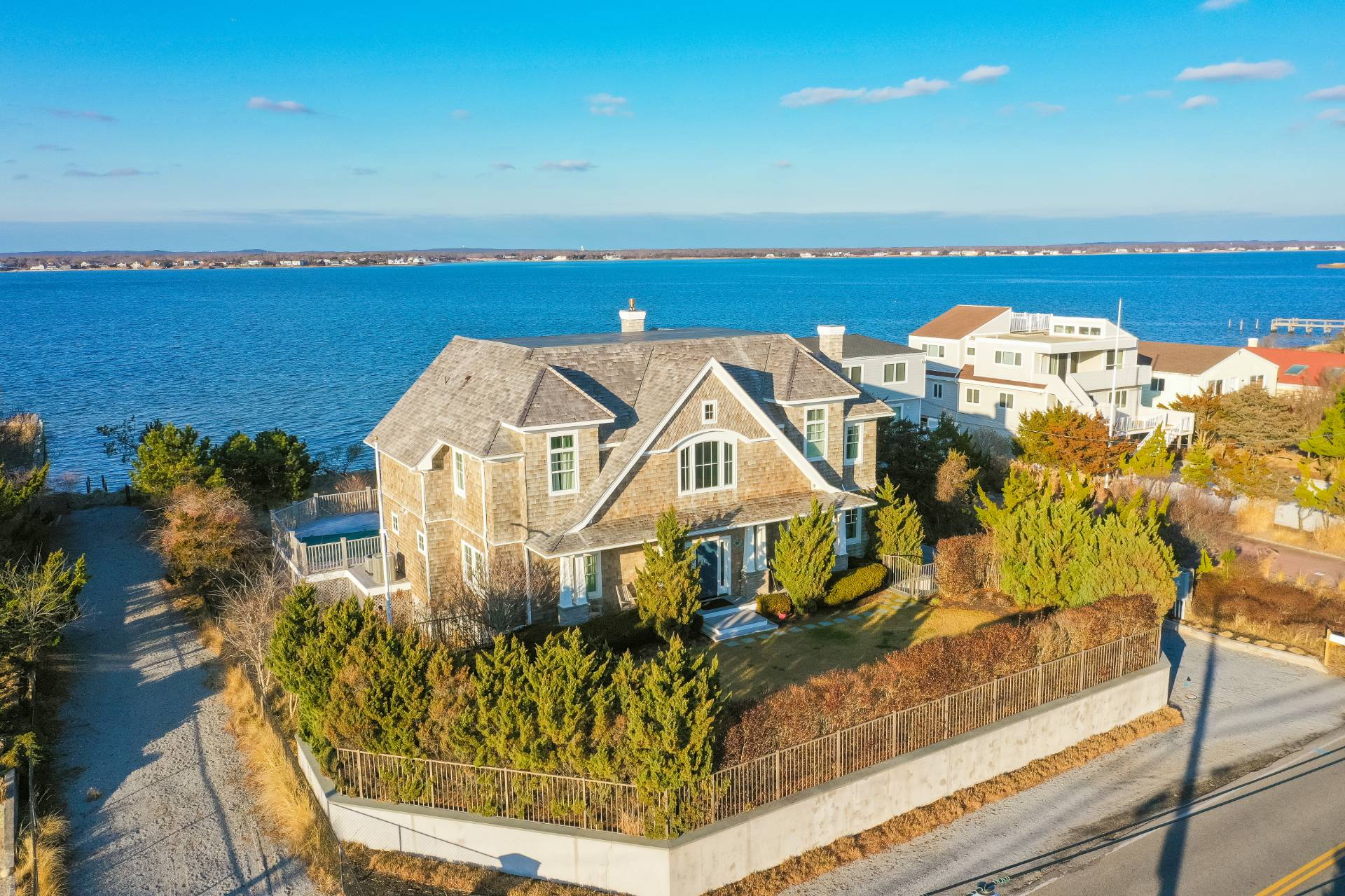 Undisclosed Address Westhampton, NY 11978 - Photo 4 of 22 an aerial view of a house with a ocean view