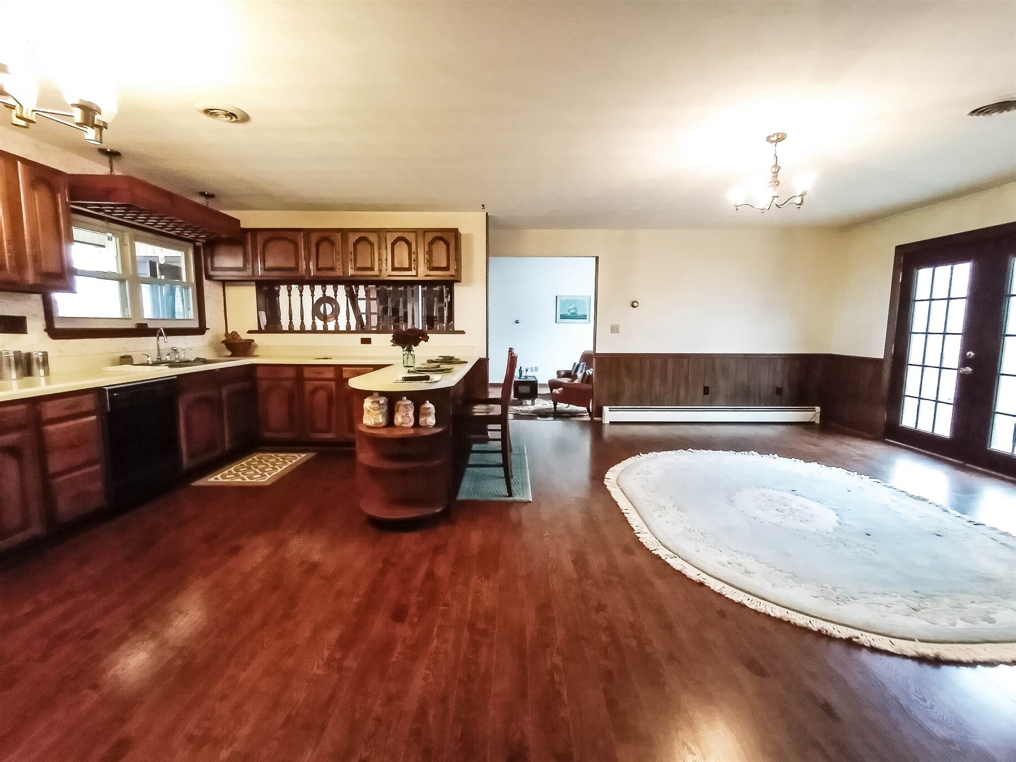 619 Miller Farm Road Staunton, VA 24401 - Photo 12 of 40 a living room with stainless steel appliances granite countertop a couch a dining table and chairs
