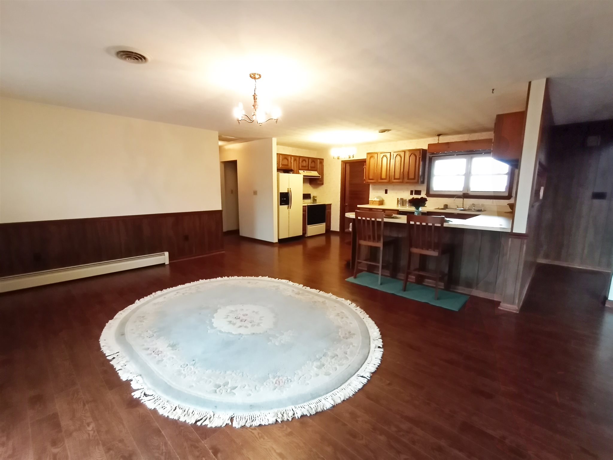 619 Miller Farm Road Staunton, VA 24401 - Photo 16 of 40 a view of kitchen and dining room with wooden floor