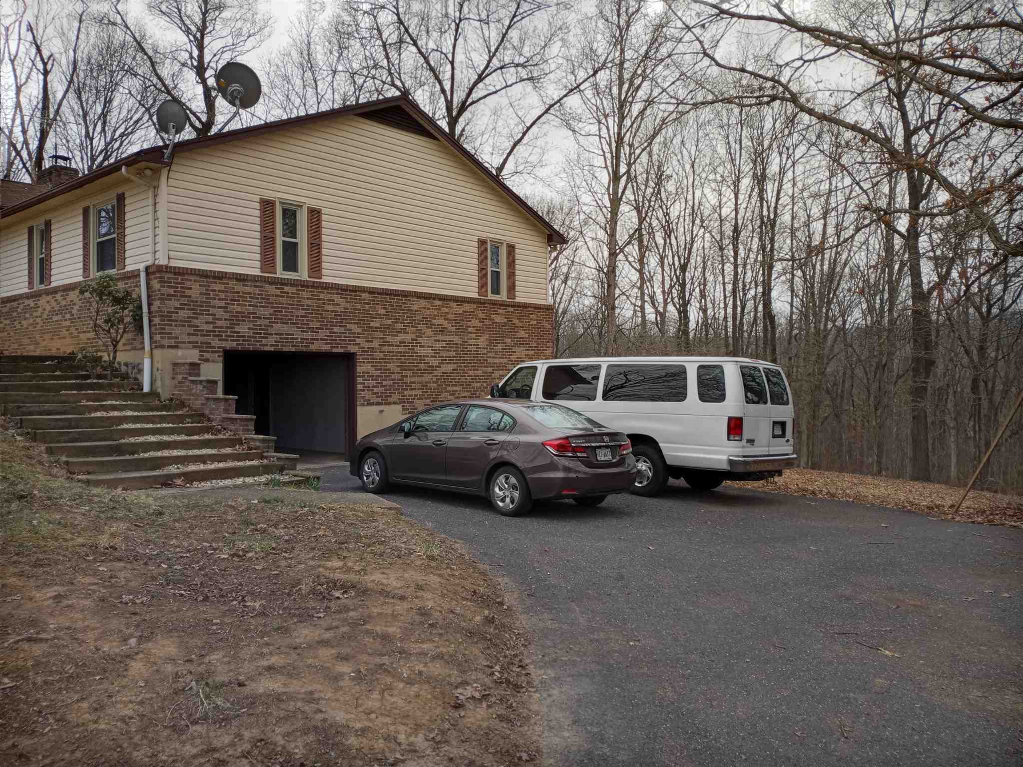 619 Miller Farm Road Staunton, VA 24401 - Photo 2 of 40 a car parked in front of house