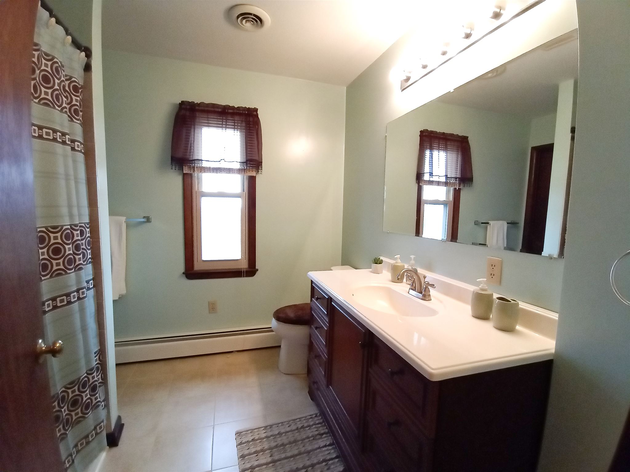 619 Miller Farm Road Staunton, VA 24401 - Photo 24 of 40 a bathroom with a sink and a mirror