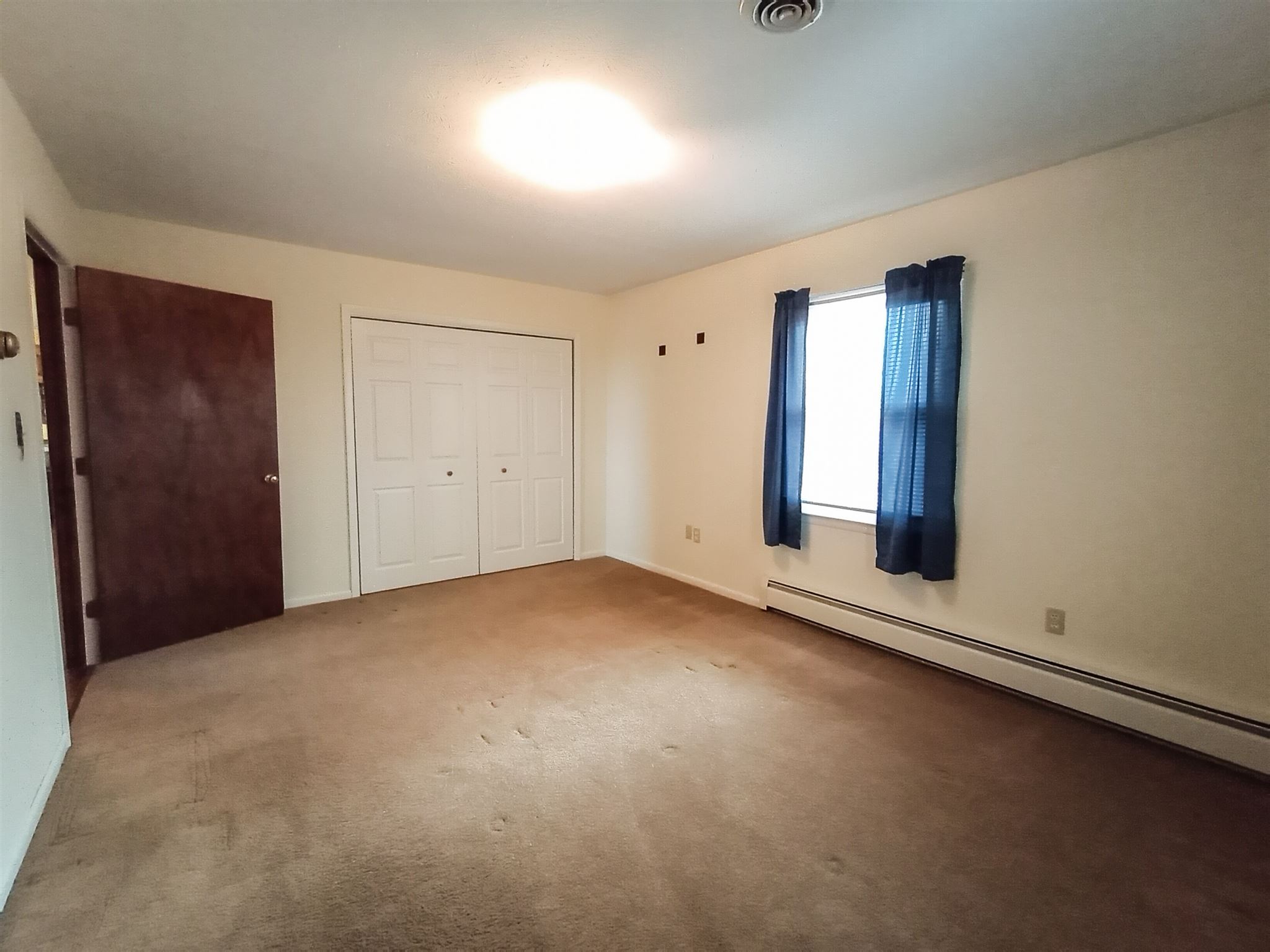 619 Miller Farm Road Staunton, VA 24401 - Photo 27 of 40 an empty room with windows