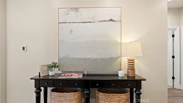 a spacious bedroom with a bed and a couch