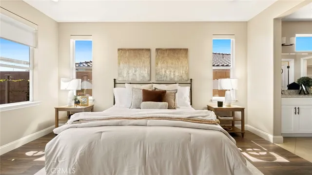 a bedroom with a bed and window