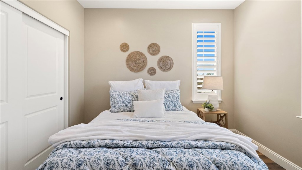 867 Trail View Place Nipomo, CA 93444 - Photo 36 of 71 a bedroom with a bed and window