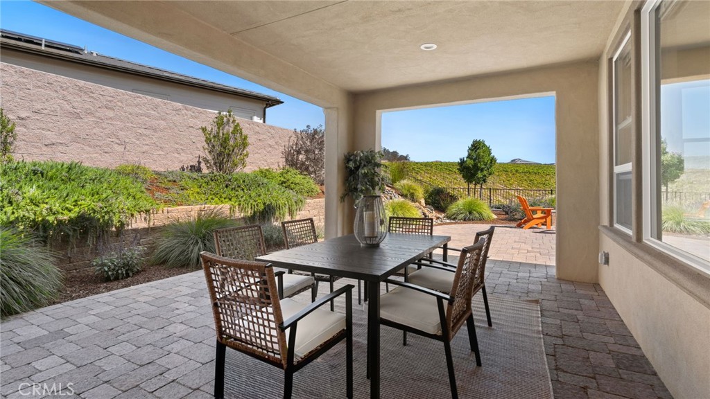 867 Trail View Place Nipomo, CA 93444 - Photo 47 of 71 a view of an outdoor dining space with furniture and front view