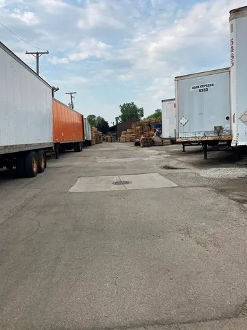 a view of a street with cars