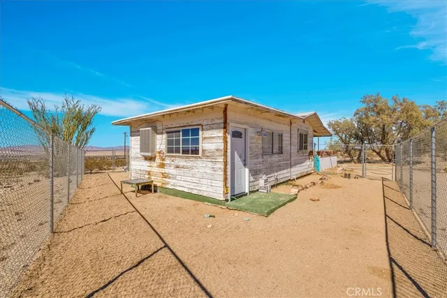 a view of a house with a patio
