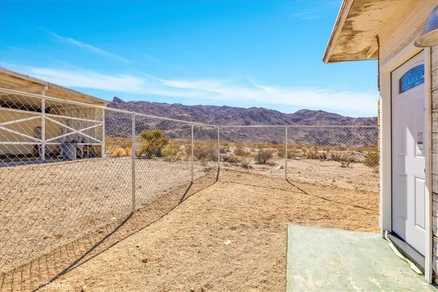 a front view of a house with patio