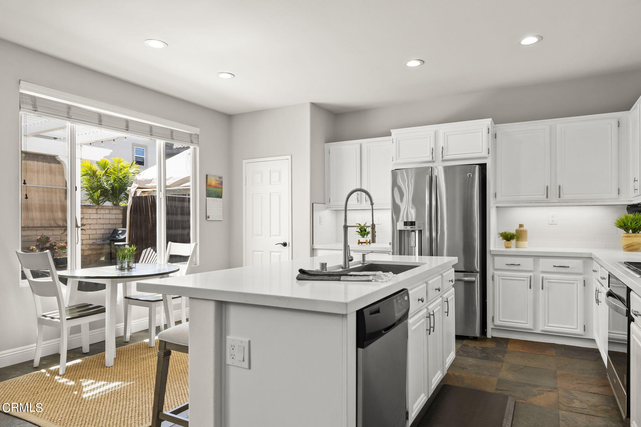 4654 Via Dulce Camarillo, CA 93012 - Photo 15 of 51 a kitchen with stainless steel appliances granite countertop a sink stove and refrigerator