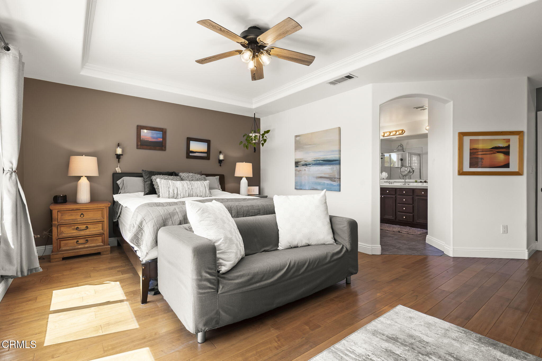 4654 Via Dulce Camarillo, CA 93012 - Photo 36 of 51 a bed room with a bed and a chandelier