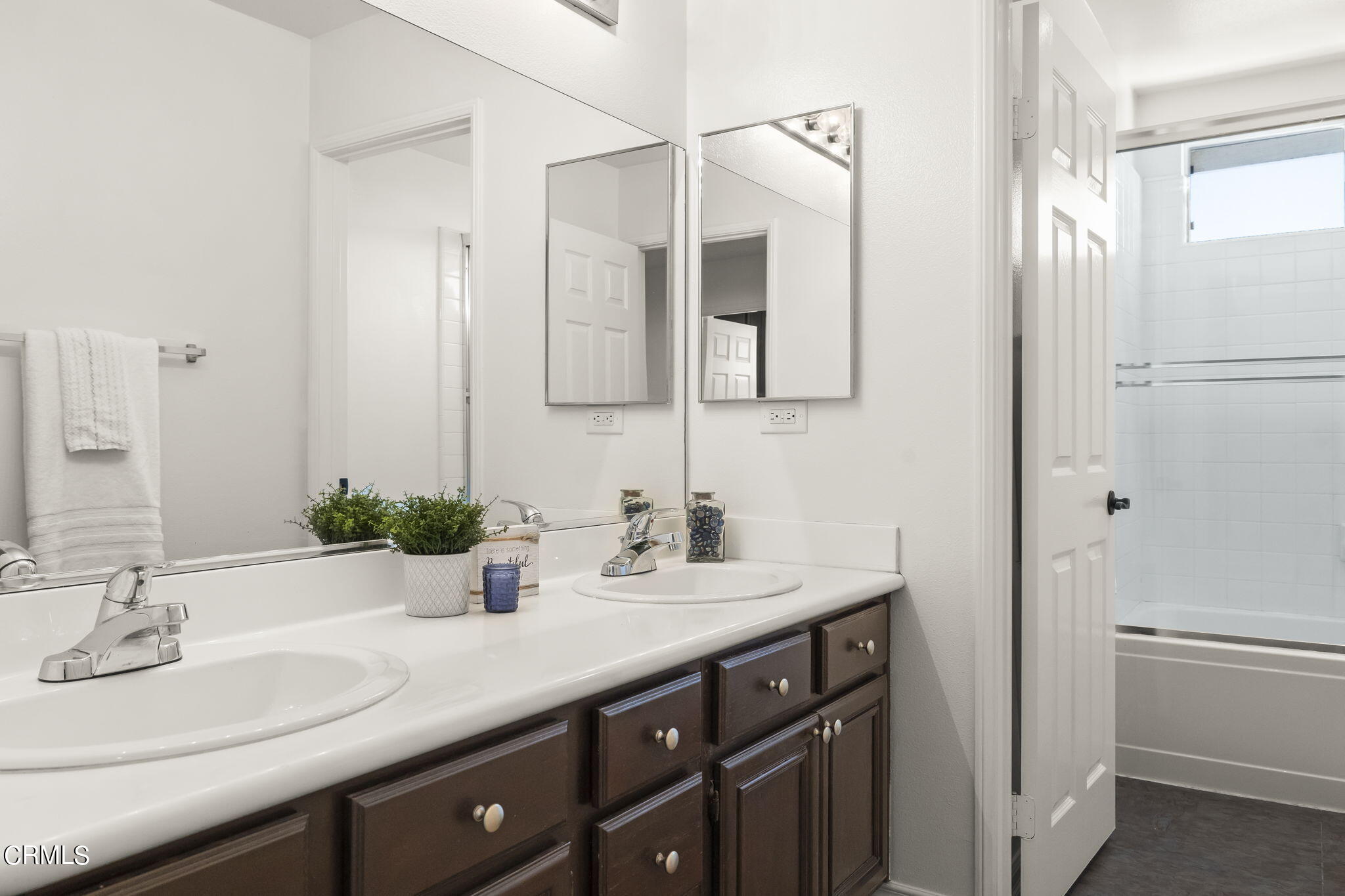 4654 Via Dulce Camarillo, CA 93012 - Photo 44 of 51 a bathroom with a sink and a mirror