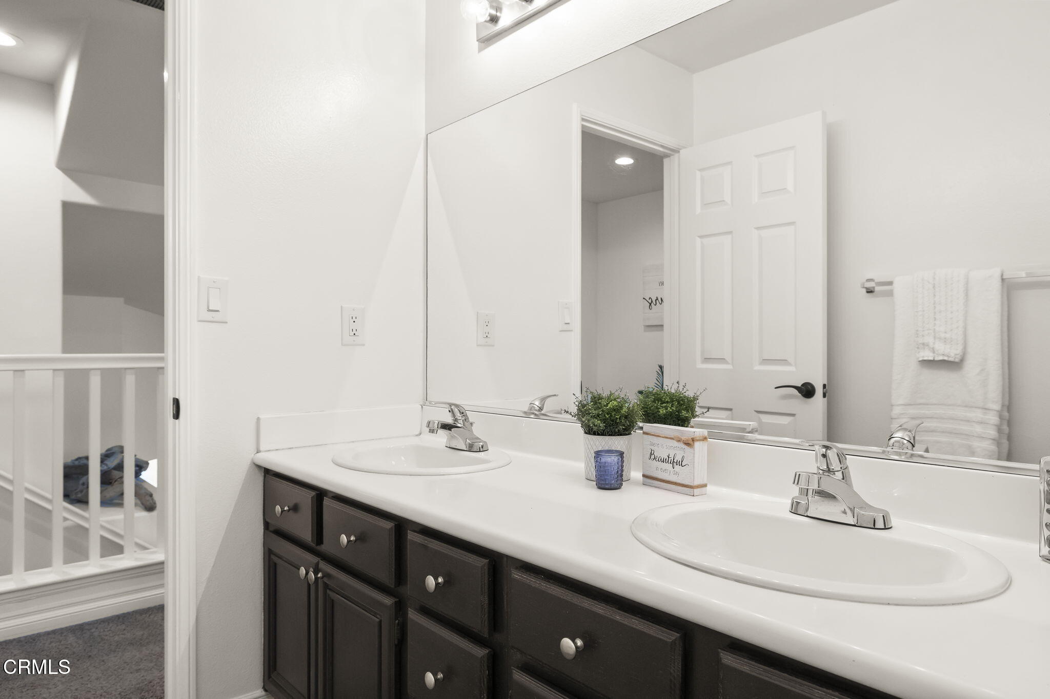 4654 Via Dulce Camarillo, CA 93012 - Photo 45 of 51 a bathroom with double sink and a mirror