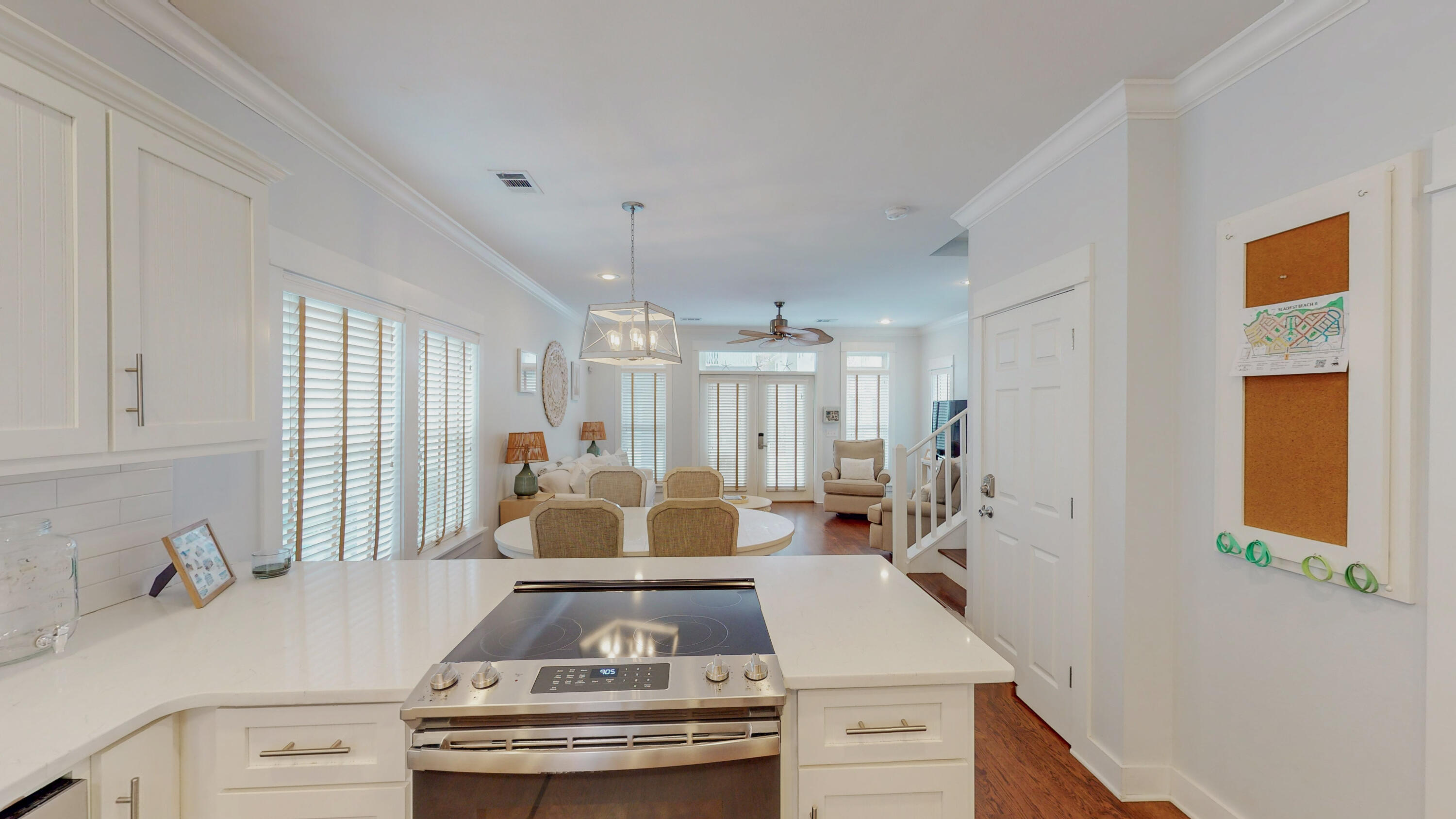 249 Beach Bike Way Inlet Beach, FL 32461 - Photo 15 of 38 a view of a kitchen with kitchen island a counter top space a sink a stove and a window
