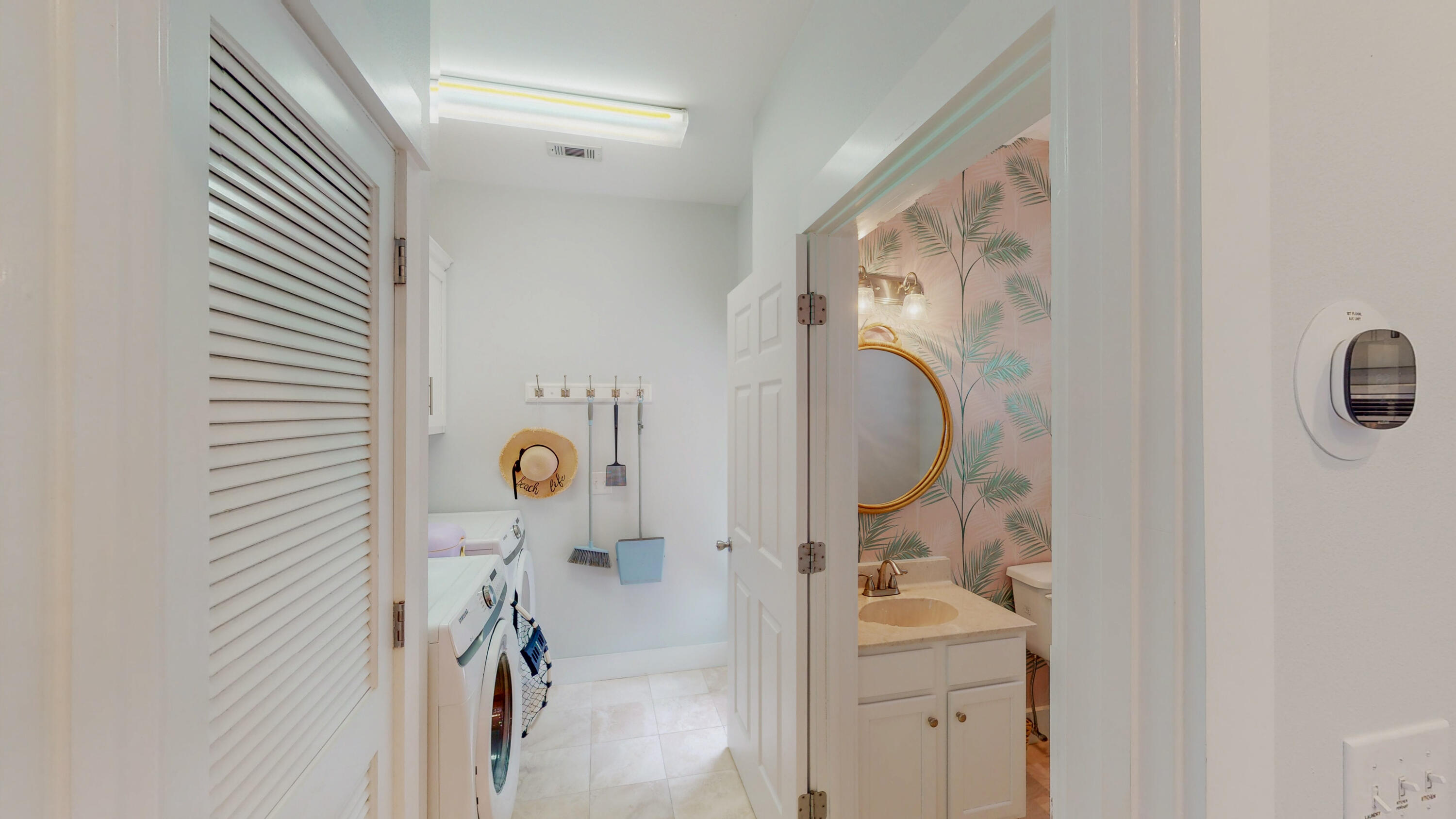 249 Beach Bike Way Inlet Beach, FL 32461 - Photo 17 of 38 a bathroom with a sink and mirror with shower