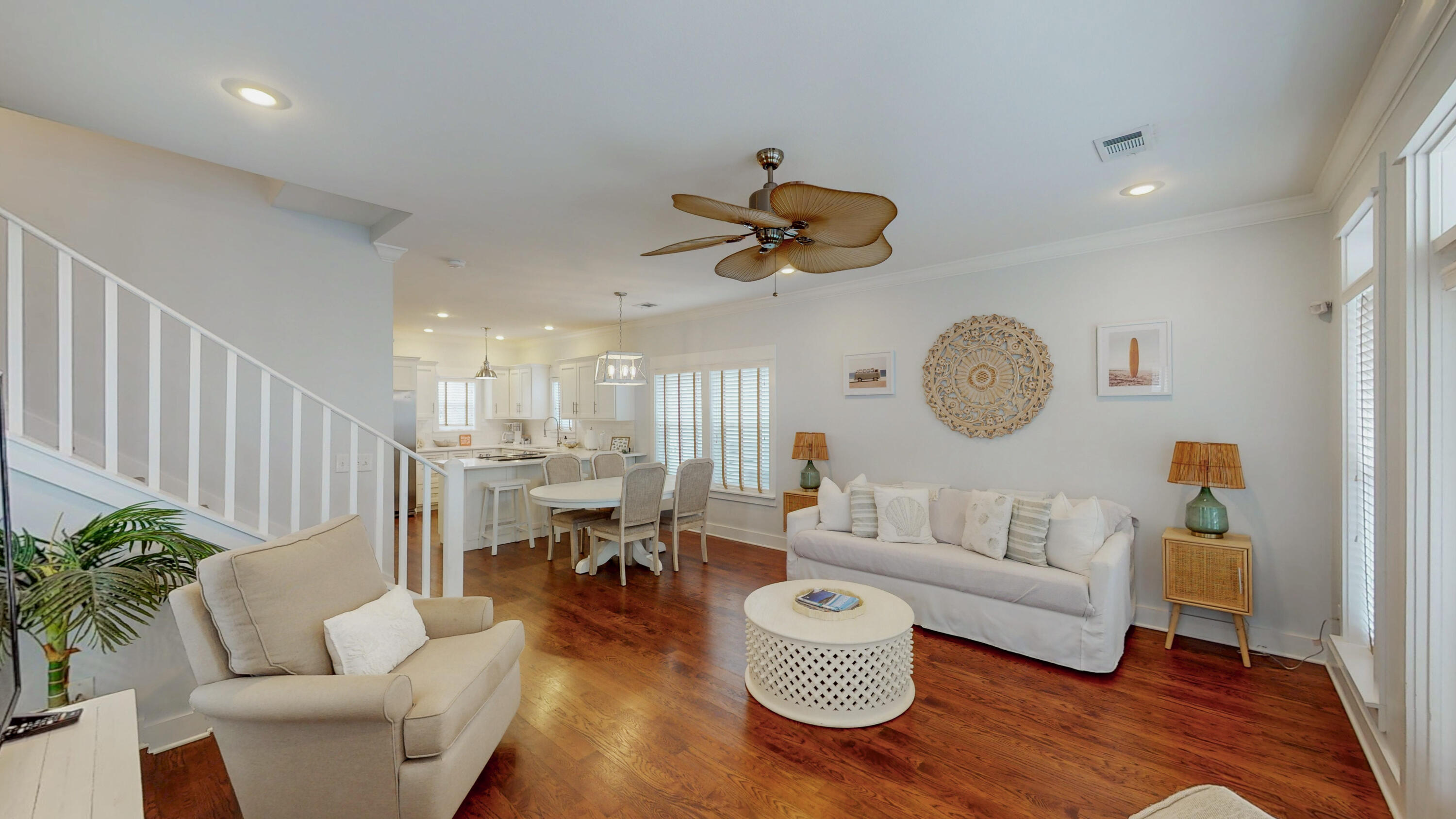 249 Beach Bike Way Inlet Beach, FL 32461 - Photo 4 of 38 a living room with furniture kitchen view and a chandelier