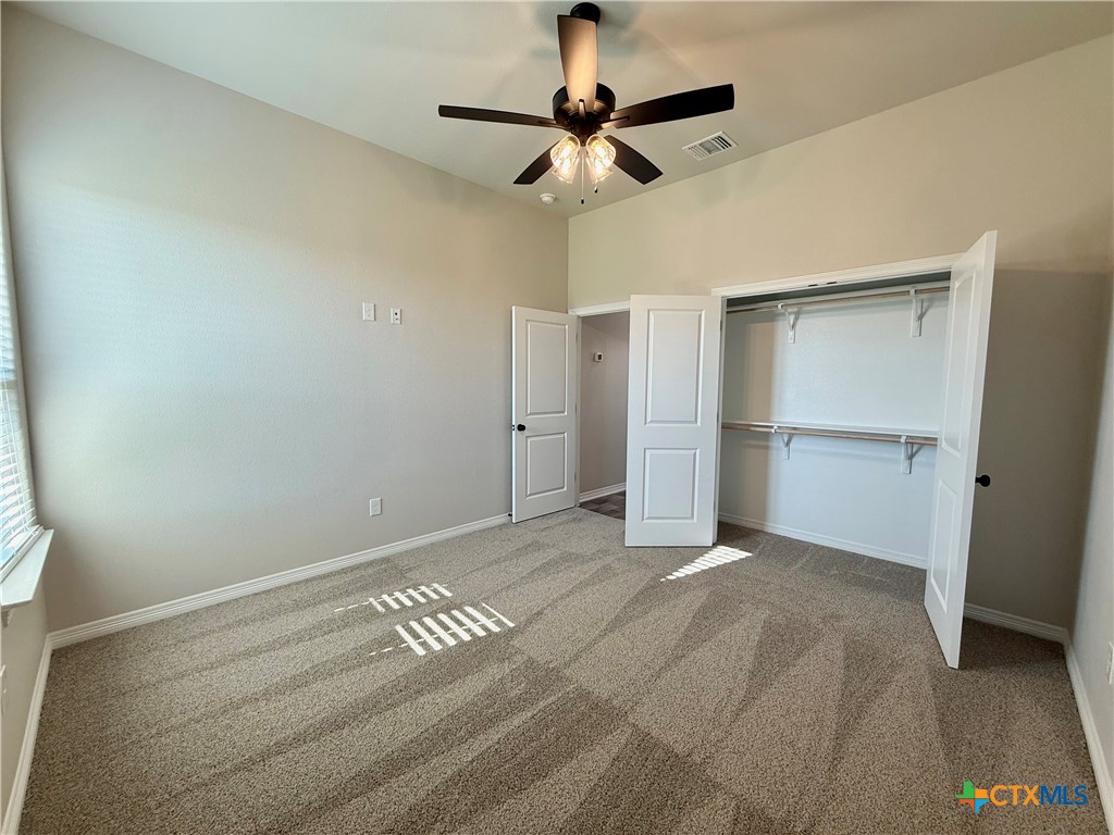 4433 Agave Trail Temple, TX 76502 - Photo 14 of 27 a view of an empty room with a ceiling fan