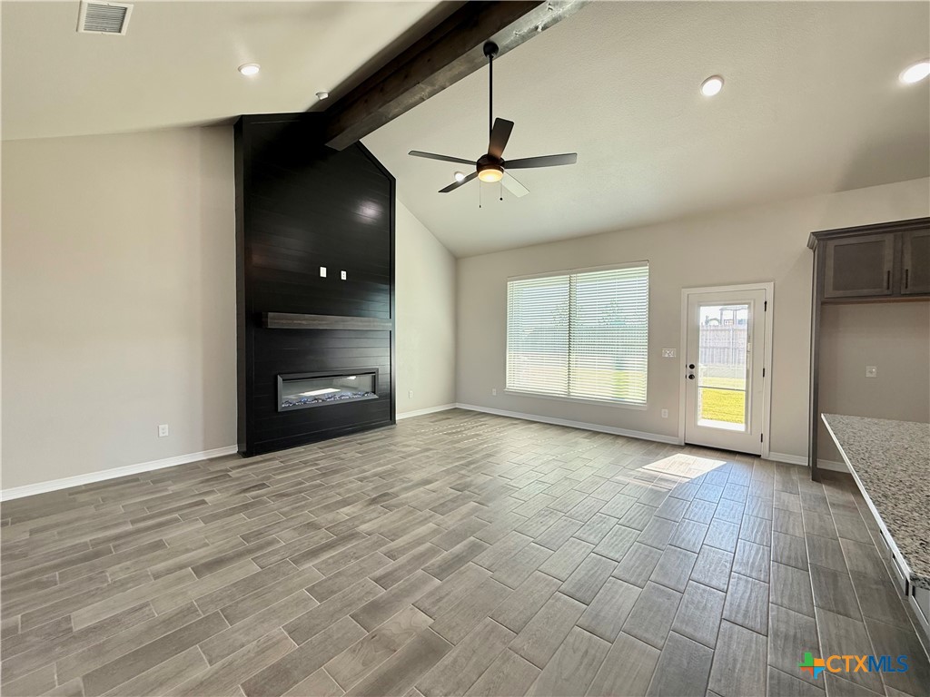 4433 Agave Trail Temple, TX 76502 - Photo 4 of 27 a view of an empty room with window and cabinet