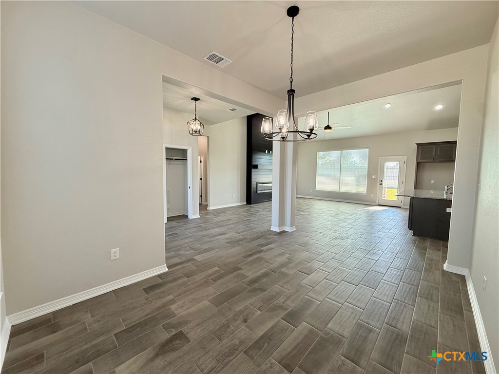 4433 Agave Trail Temple, TX 76502 - Photo 6 of 27 a view of a kitchen with a sink and a chandelier